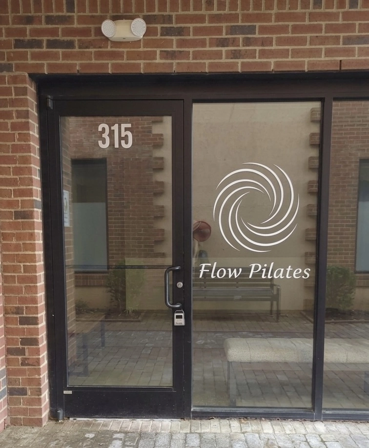 Flow Pilates studio entrance at The Courtyard on West Franklin Street in Chapel Hill
